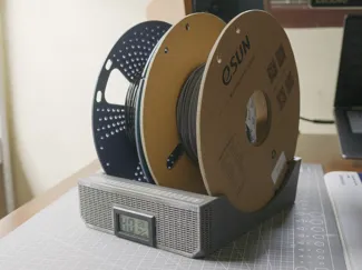 Dual spool holder with removable desiccant storage