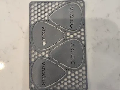 Guitar picks with band names