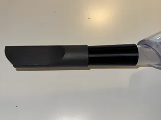 Extension for handheld vacuum