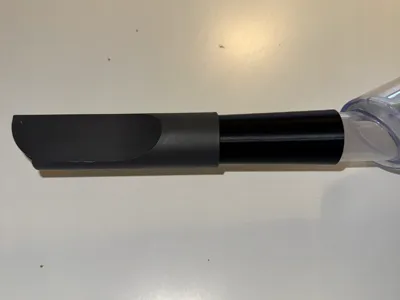 Extension for handheld vacuum