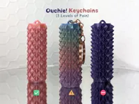 Porte-clés fidget Ouchie (3 niveaux) — photo 1