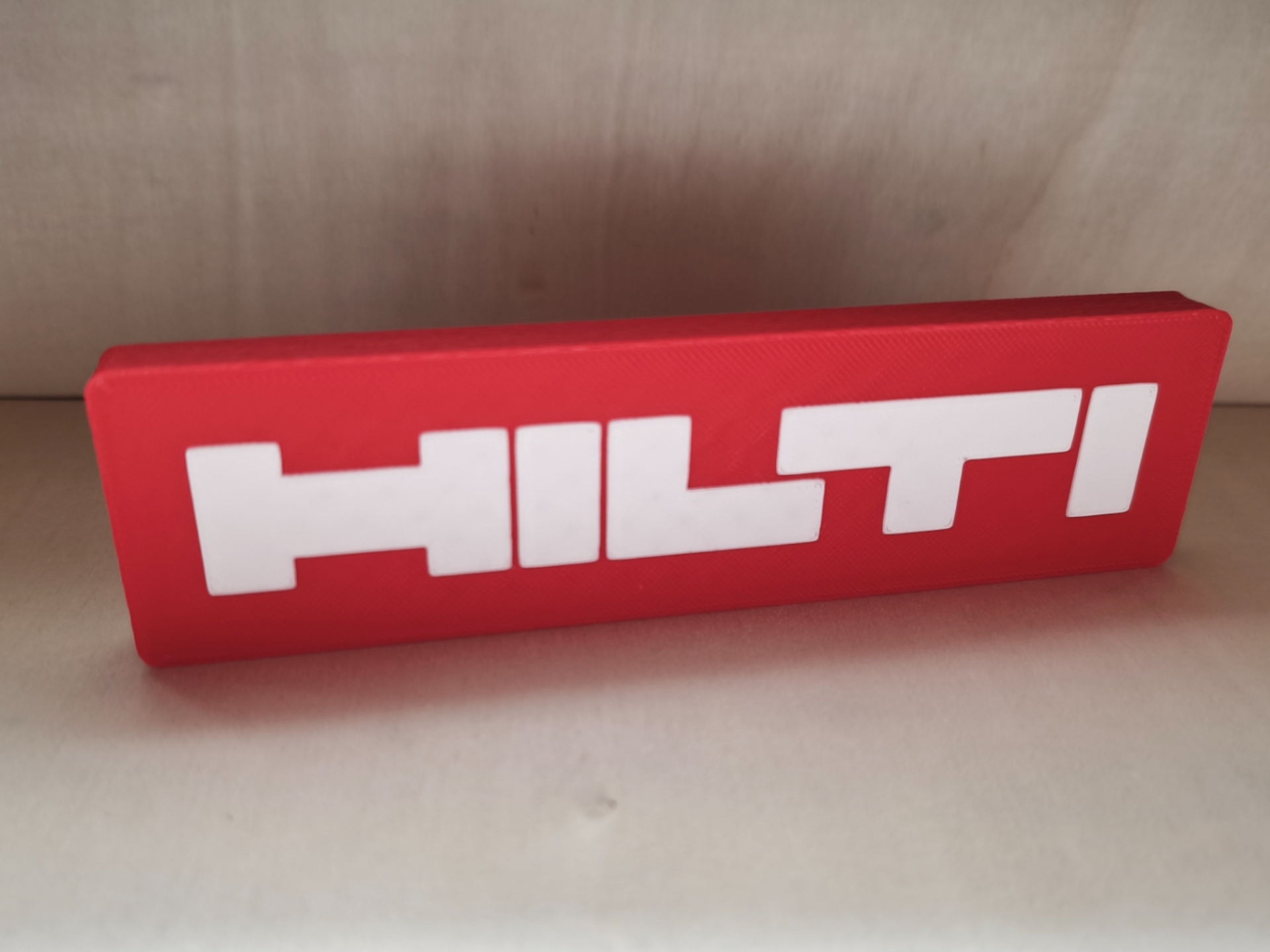 Hilti logo plate