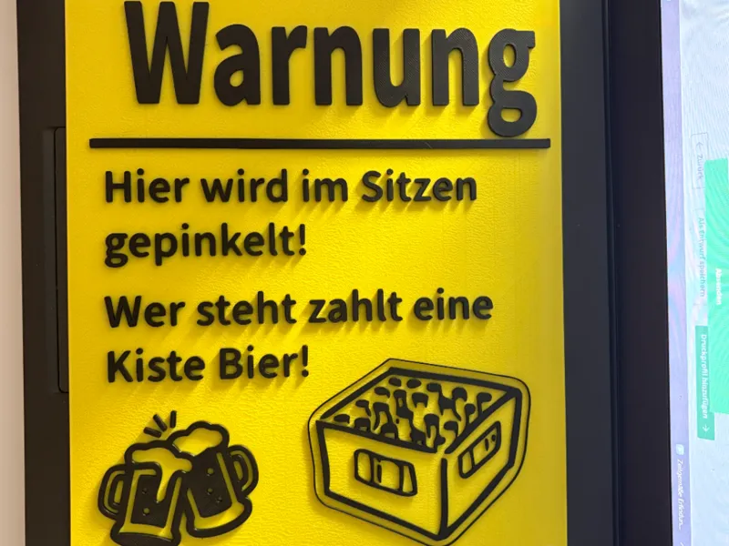 Schild im Sitzen pinkeln