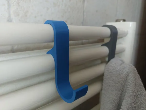 Porte-serviettes pour tube de radiateur