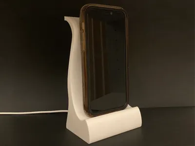 Phone stand with charger hole