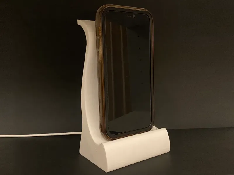 Phone stand with charger hole