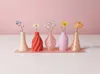 A set of 5 mini bud vases