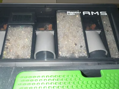 Transparent dessicant box for AMS