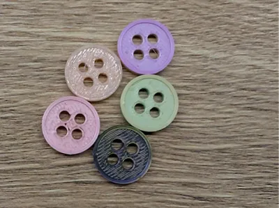 15, 20, and 25 mm diameter buttons