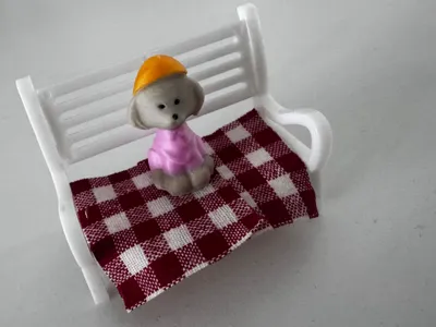 Cute dog sitting on bench