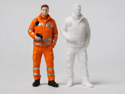 Railway worker in orange protective clothing for LGB