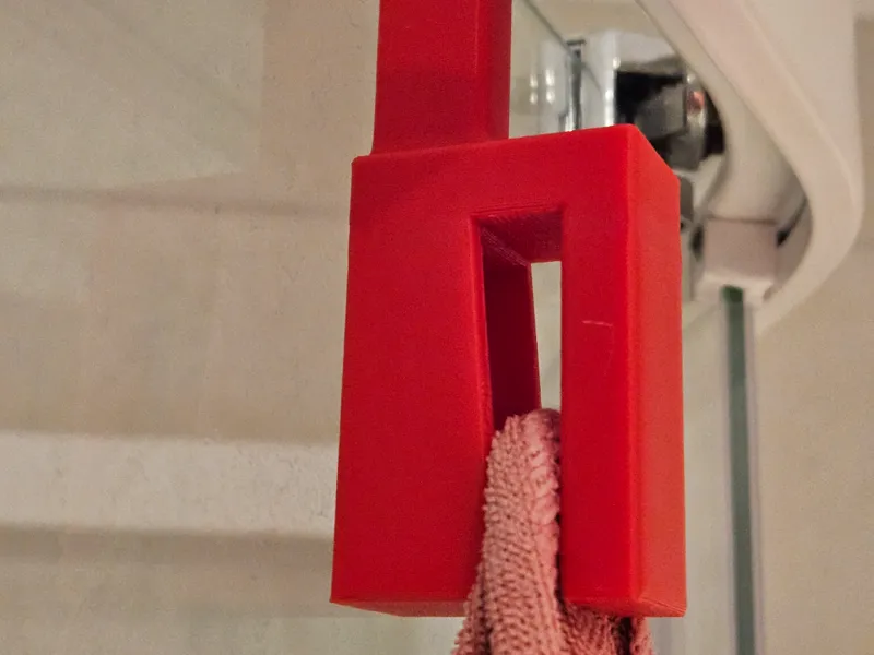 Towel holder with different hooks
