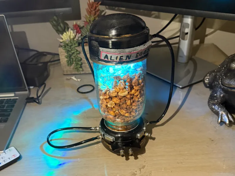 Alien hibernation chamber candy dispenser