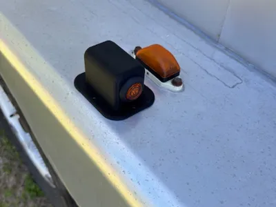 Trailer fender clearance light housing