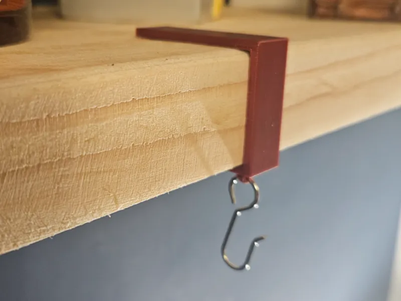 Shelf clip for hanging decorations