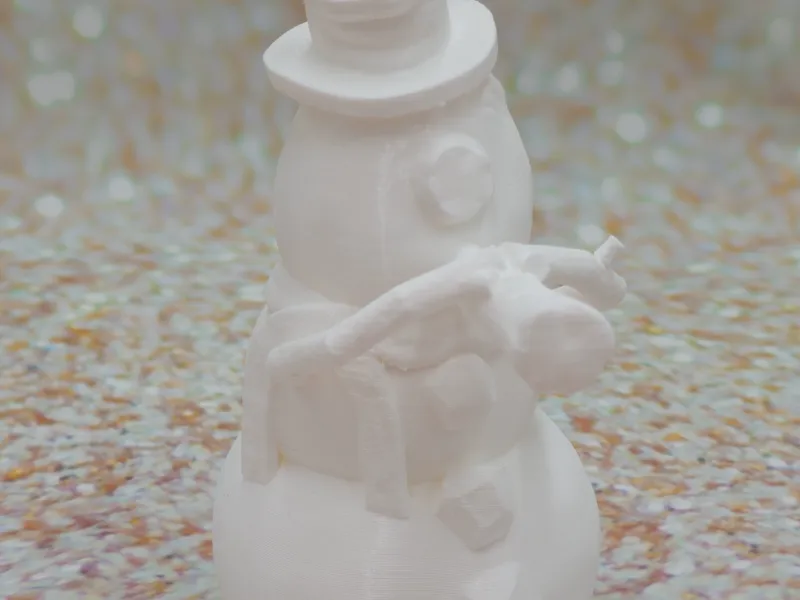 Snowman playing a carrot horn