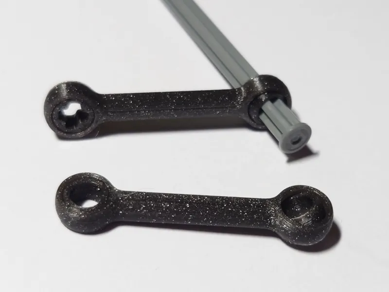 Links with integrated ball joint connection