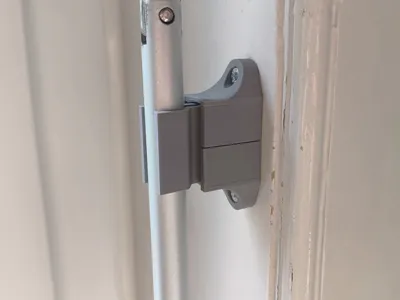 Clamp holder for roller shutter crank/window rod