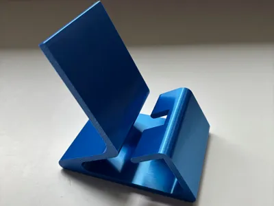 Phone stand with charger access