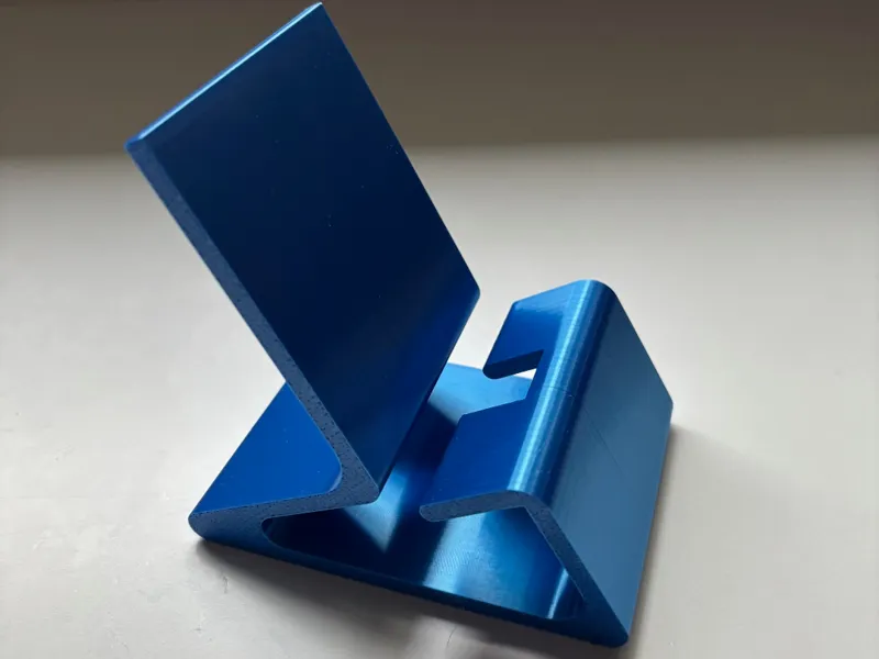 Phone stand with charger access