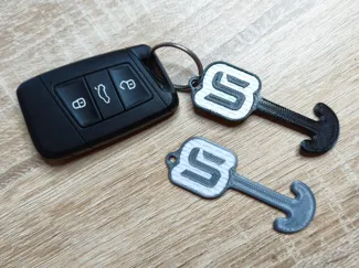 Removable shopping cart token with Skoda logo