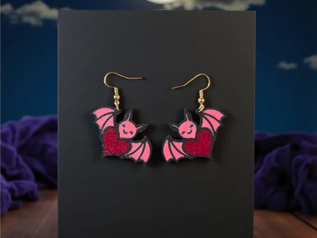 Tender bat heart earrings