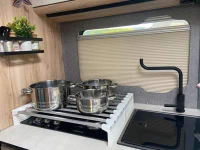 Camping storage shelf for the stove