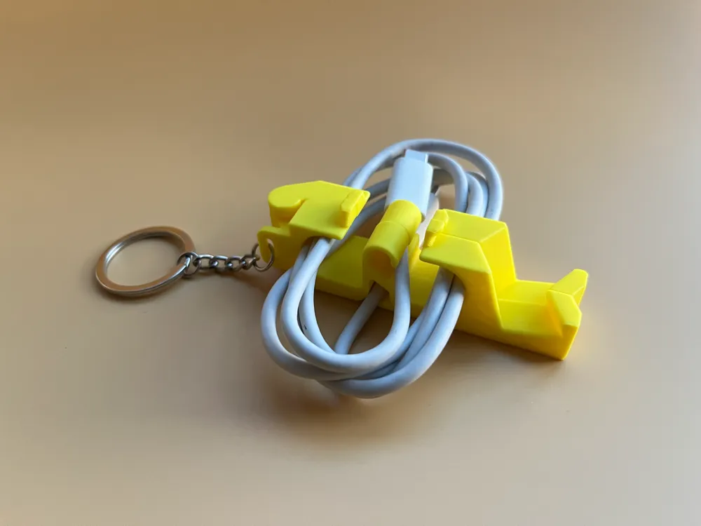 PCS-03 Phone Charging Cable Storage Stand and Phone Holder - Free 3D Print Model - MakerWorld PCS-03 Phone Charging Cable Storage Stand and Phone Holder - Free 3D Print Model - MakerWorld