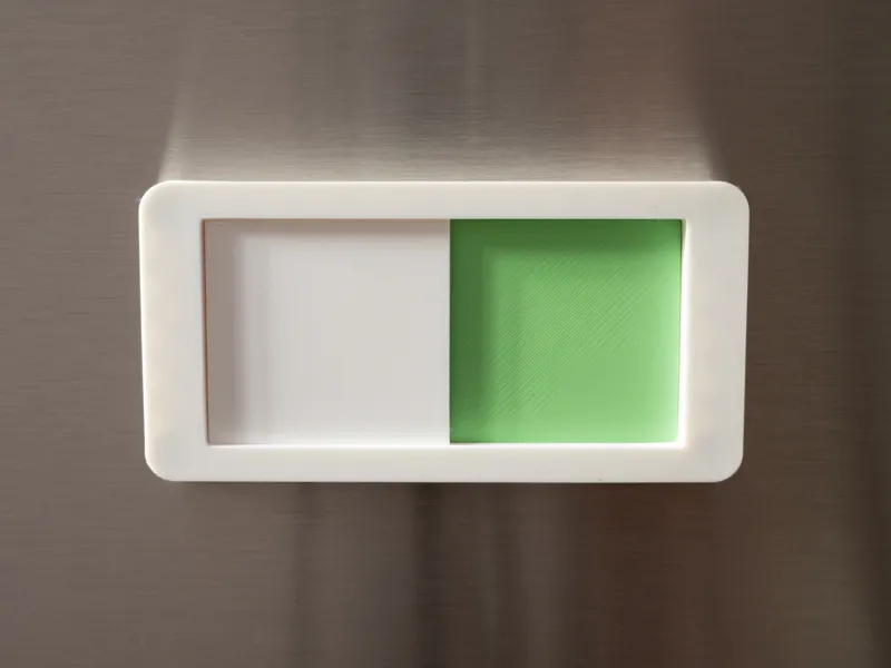 Dishwasher status slider, magnetic