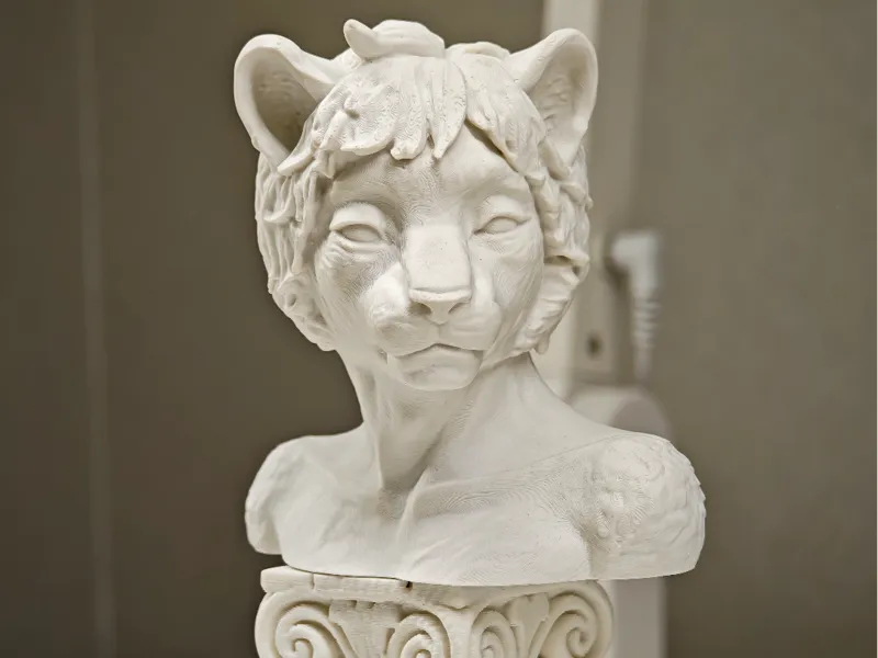 Greek anthropomorphic feline bust, with stand