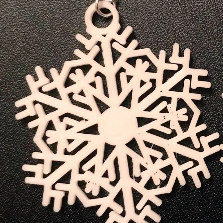 Snowflake earrings or Christmas tree decorations view 2