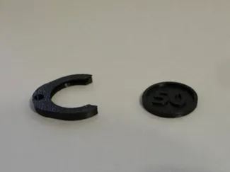 Coin Holder and Coin (50 Cent)