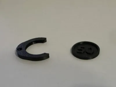 Coin Holder and Coin (50 Cent) 