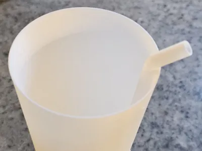 Drinking cup with straw