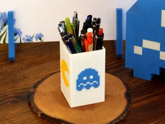 Pac-Man pencil or pen holder cup OR a flower vase