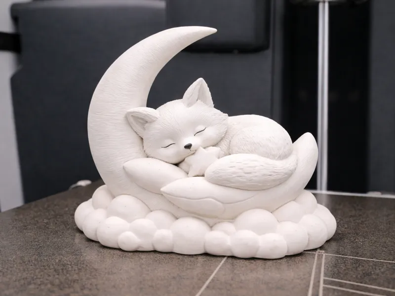 Sleeping fox on a moon