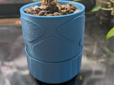 Self-watering pot with fuzzy skin