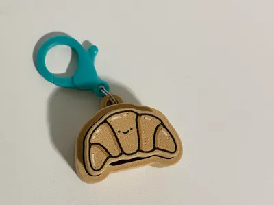 Croissant Fidget Clicker Keychain