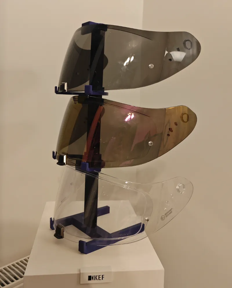Helmet visor holder