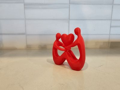 Held Close – A Minimalist Love Sculpture
