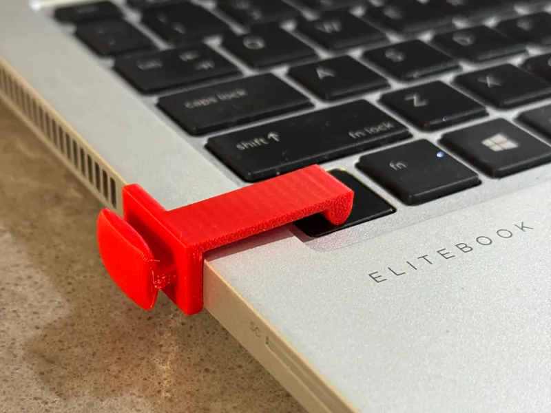 Keyboard Control key depressor. 