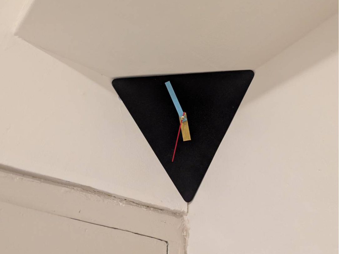 Ceiling corner clock