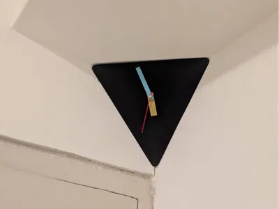 Ceiling corner clock