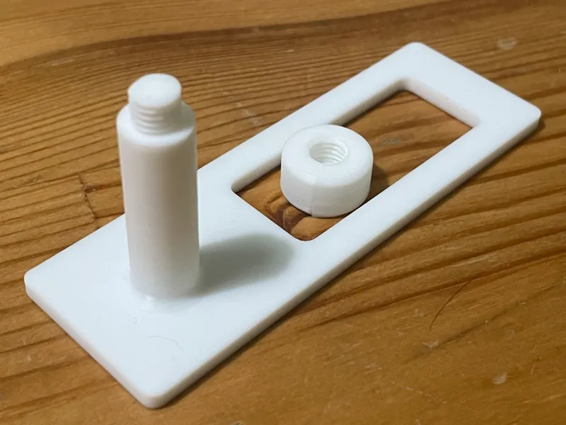 Cable holder under power plug