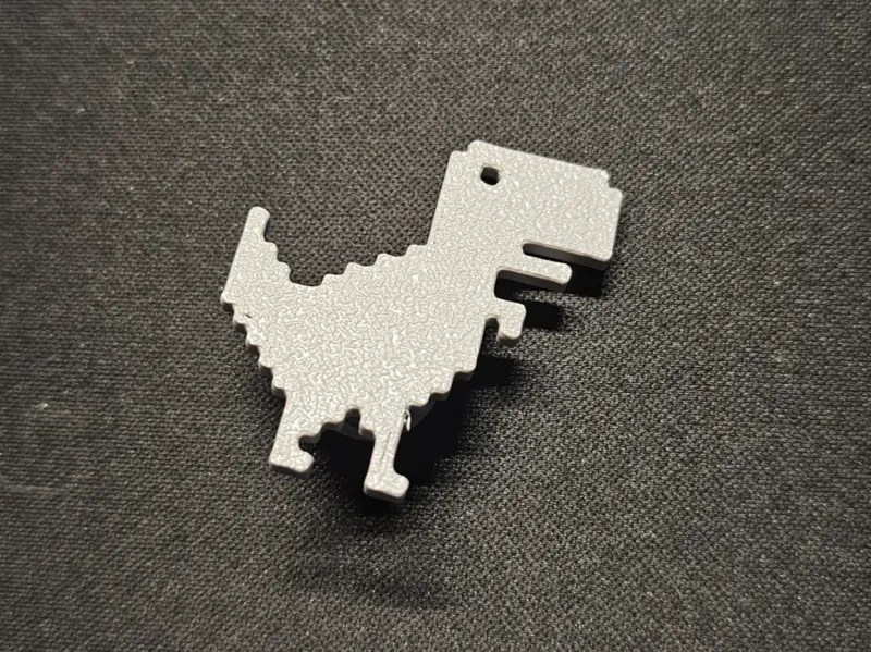 Jibbitz Chrome Dinossaur