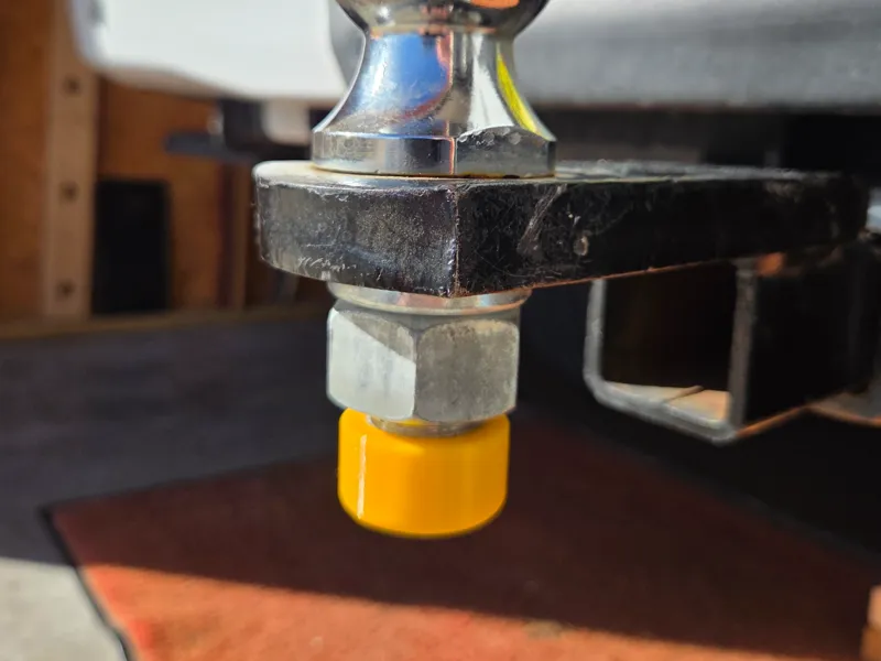 Trailer hitch ball thread cover