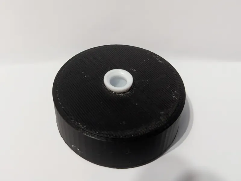Inverted cap stand for 8oz bottle of Aleene’s glue
