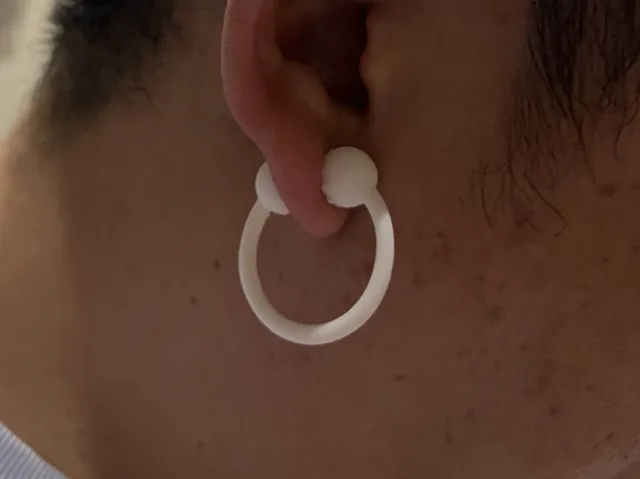 Massaging earrings