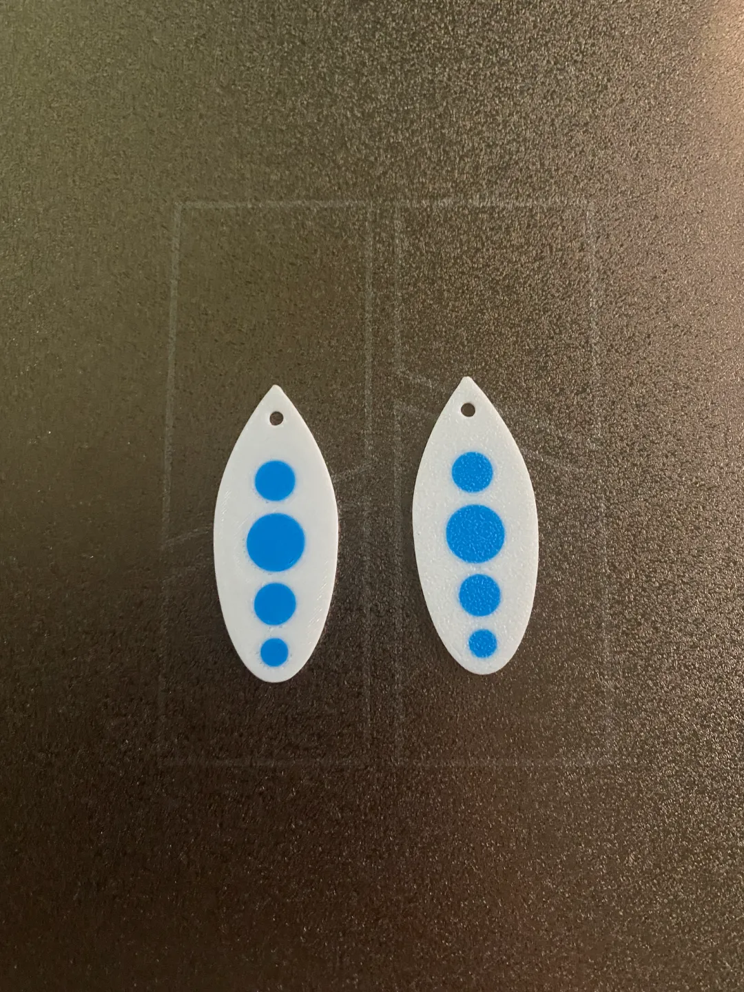 white and blue earrings view 2