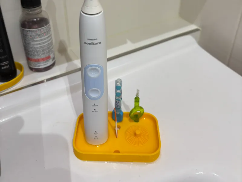 Philips toothbrush and interdental combined holder